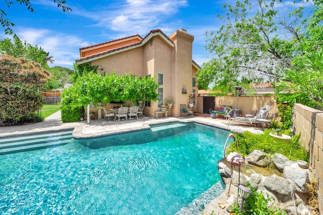 39884 Golfers Dr, Palmdale, CA 93551 - view of swimming pool with a fenced backyard and a patio area