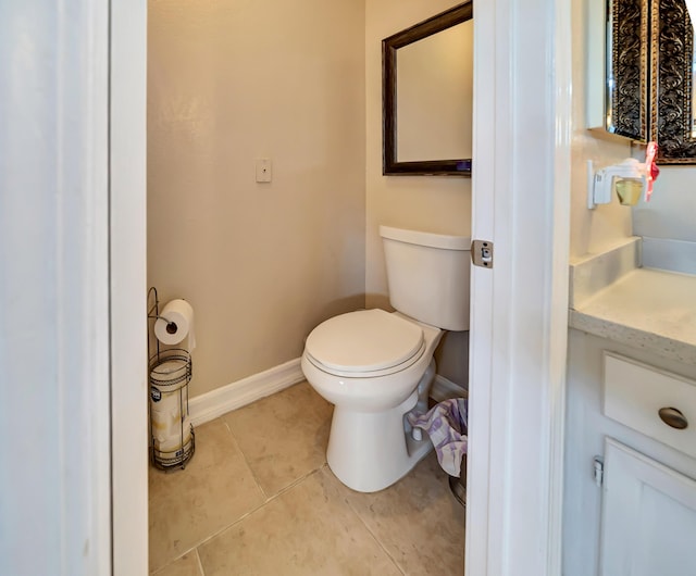 39884 Golfers Dr, Palmdale, CA 93551 - bathroom with tile patterned flooring, toilet, baseboards, and vanity