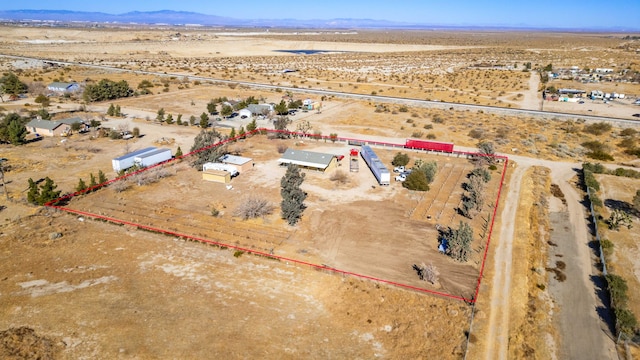 birds eye view of property featuring a rural view and a mountain view