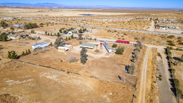 aerial view with a mountain view and a rural view