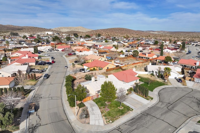 drone / aerial view with a mountain view and a residential view