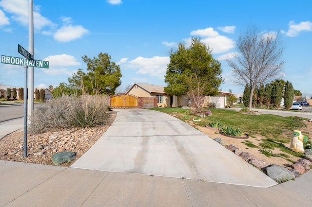 view of front of house featuring a gate and fence