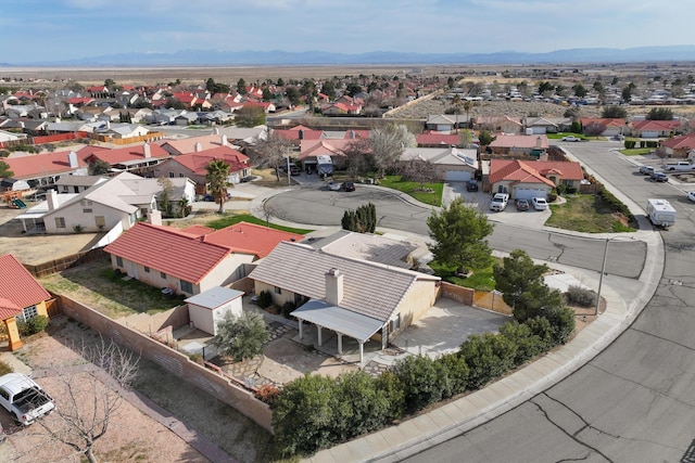 aerial view featuring a mountain view and a residential view