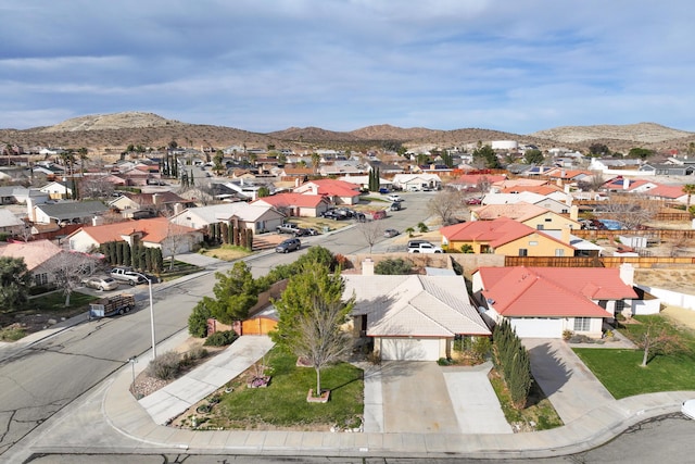 aerial view featuring a mountain view and a residential view