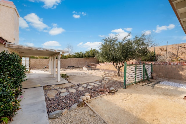 view of yard featuring a fenced backyard and a patio