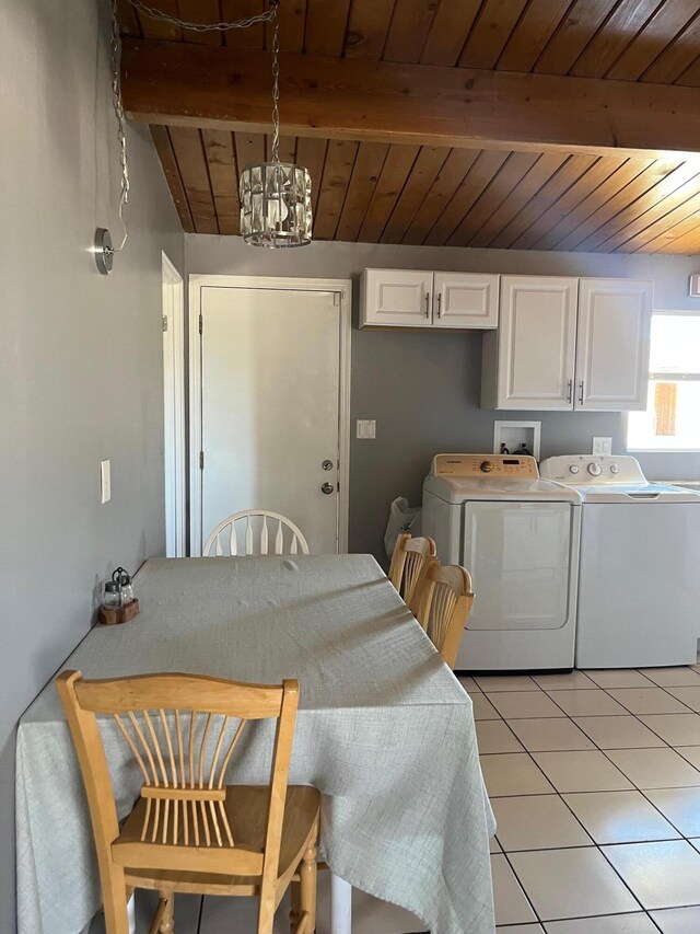 3354 Arthur Ave, Mojave, CA 93501 - dining room featuring washer and dryer, wood ceiling with exposed beams, light tile patterned floors, and a chandelier