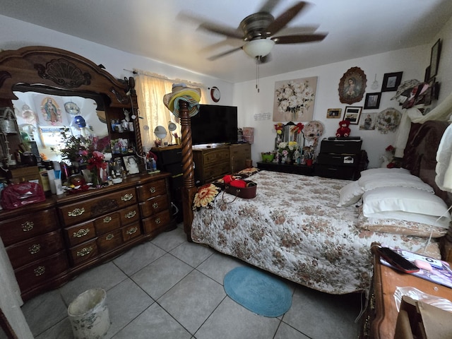 bedroom featuring tile patterned flooring and a ceiling fan