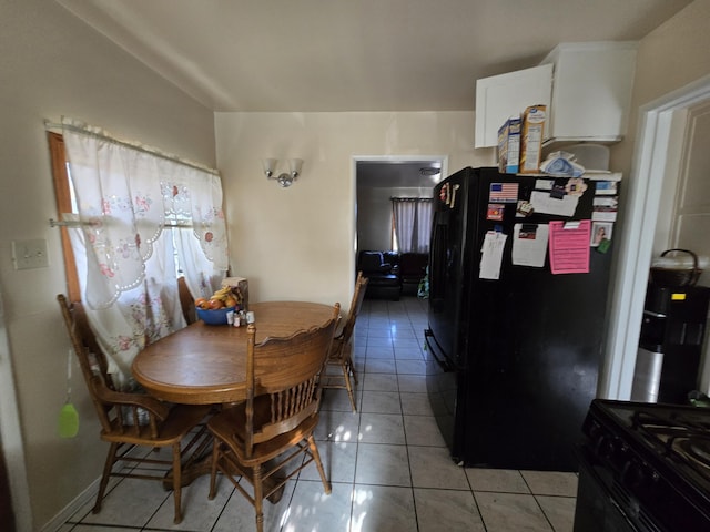 dining room with light tile patterned floors