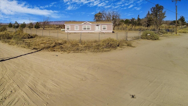 exterior space with a rural view