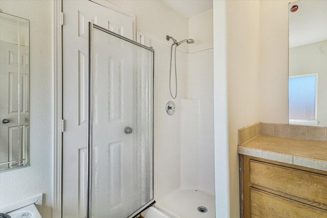 bathroom with walk in shower