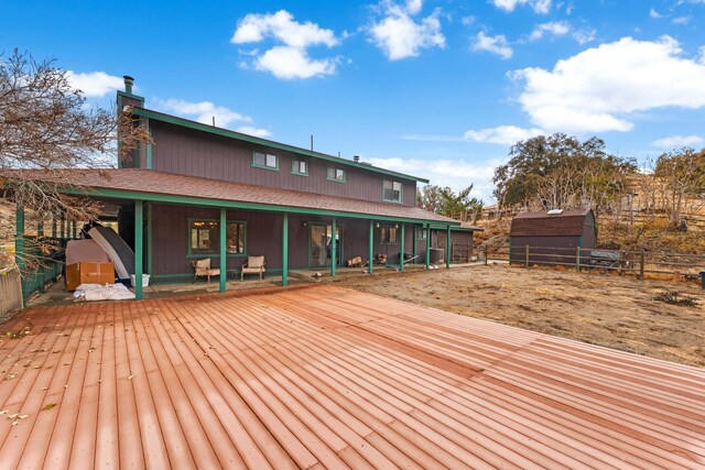 deck featuring a storage unit