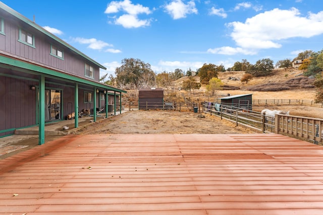 deck with an outdoor structure