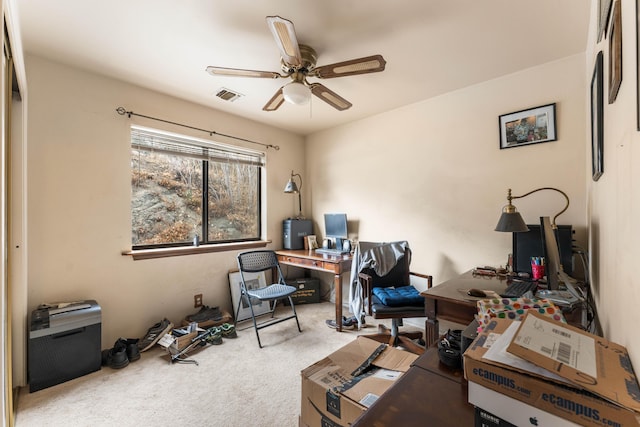 office area featuring ceiling fan and light colored carpet