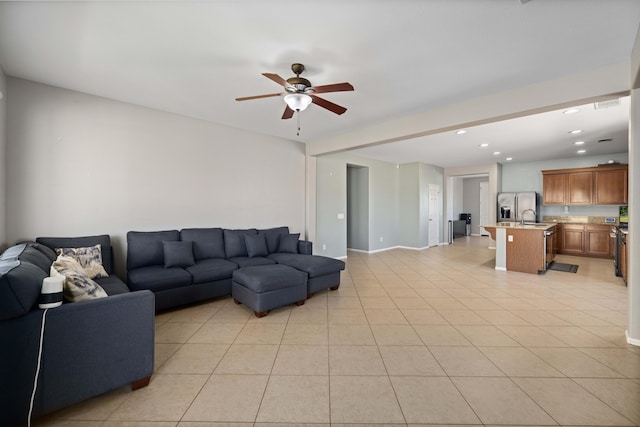 living room featuring light tile patterned flooring, ceiling fan, and recessed lighting