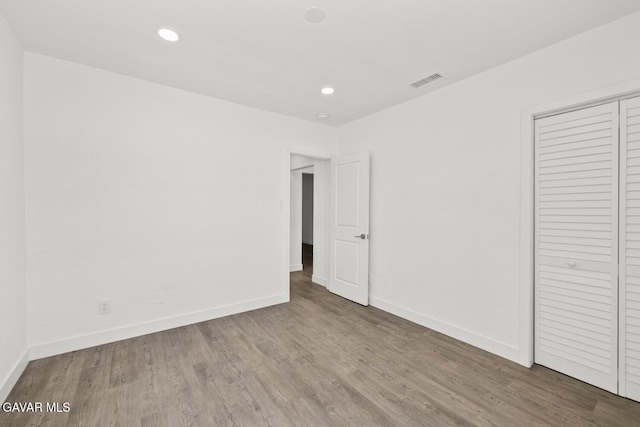 35114 E 82nd St Unit E, Littlerock, CA 93543 - unfurnished bedroom with wood finished floors, recessed lighting, and a closet