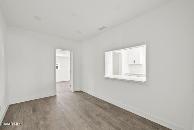 35114 E 82nd St Unit E, Littlerock, CA 93543 - unfurnished room featuring wood finished floors and baseboards
