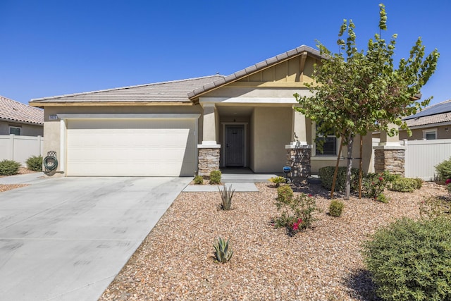 view of front of property with a garage