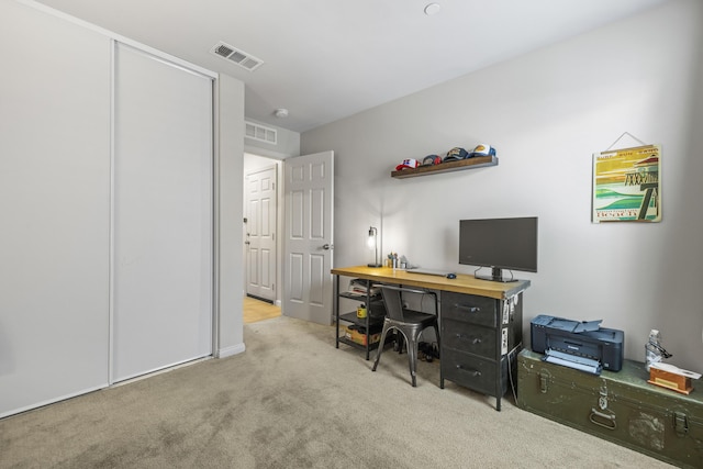 office space with light colored carpet