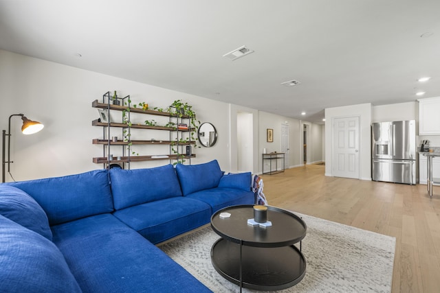 living room featuring light wood-type flooring