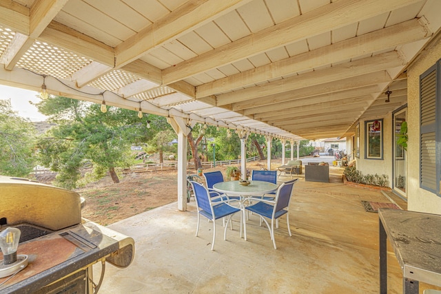 view of patio / terrace with outdoor dining area and a pergola