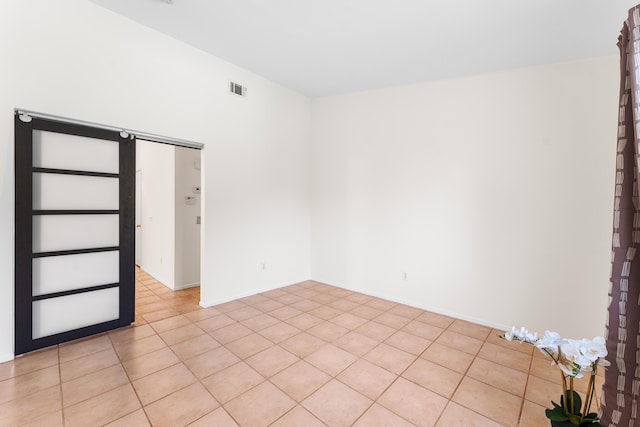 view of tiled spare room