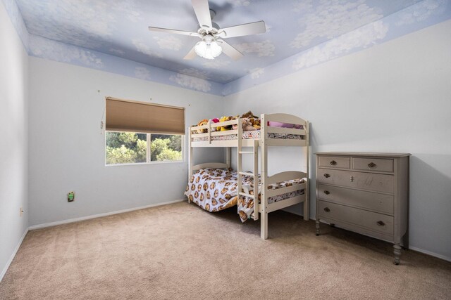 bedroom featuring carpet flooring and ceiling fan