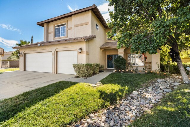 mediterranean / spanish-style house featuring a garage