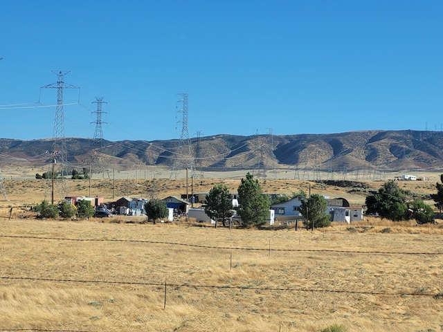 mountain view featuring a rural view