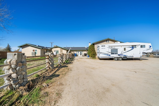 view of front of property with fence