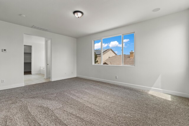 44838 Lotus Ct, Lancaster, CA 93536 - unfurnished room featuring visible vents, baseboards, and carpet floors