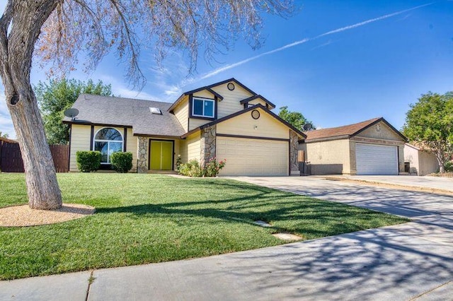 1236 Marion Ave, Lancaster, CA 93535 - traditional-style home with stone siding, concrete driveway, and an attached garage