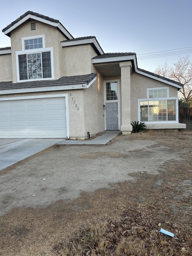 view of property with a garage