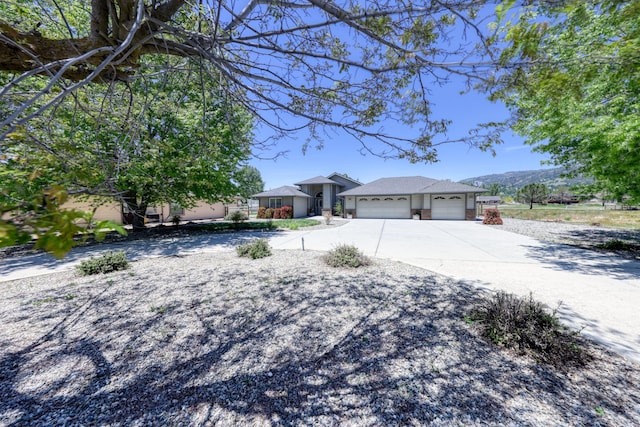 view of front of house featuring a garage and driveway