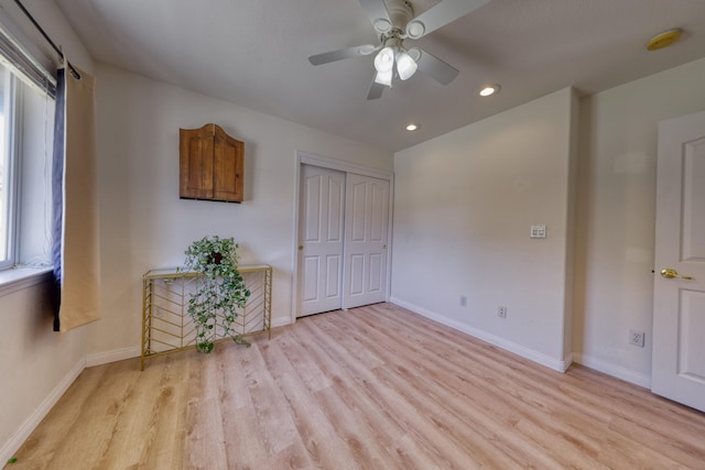 unfurnished bedroom featuring light wood-type flooring, baseboards, recessed lighting, a closet, and ceiling fan