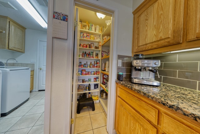 pantry featuring washer / dryer