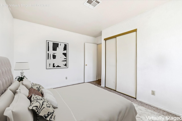 3112 Echo Dr, Rosamond, CA 93560 - bedroom featuring light colored carpet, a closet, and baseboards
