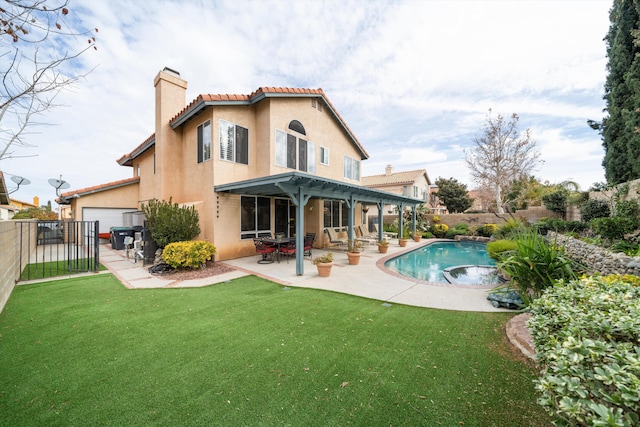 rear view of property with a patio, a pergola, and a lawn