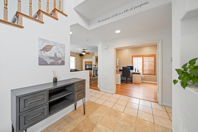 hallway featuring light tile patterned flooring