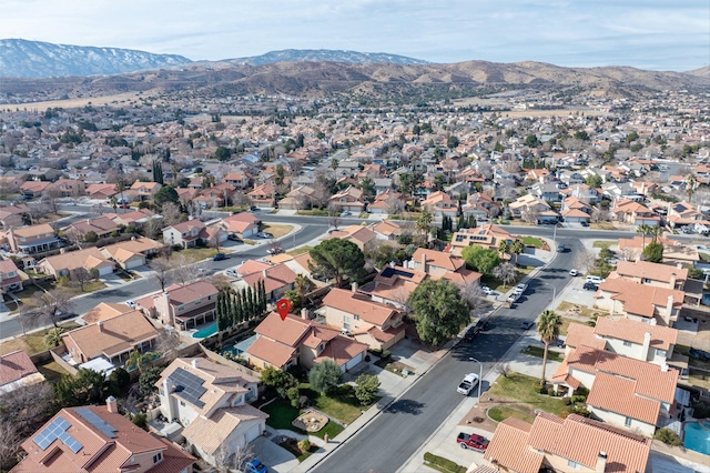 drone / aerial view featuring a mountain view