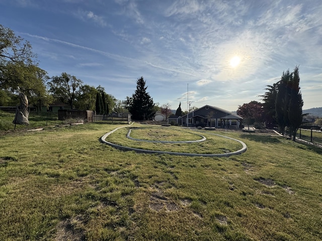 view of yard featuring fence