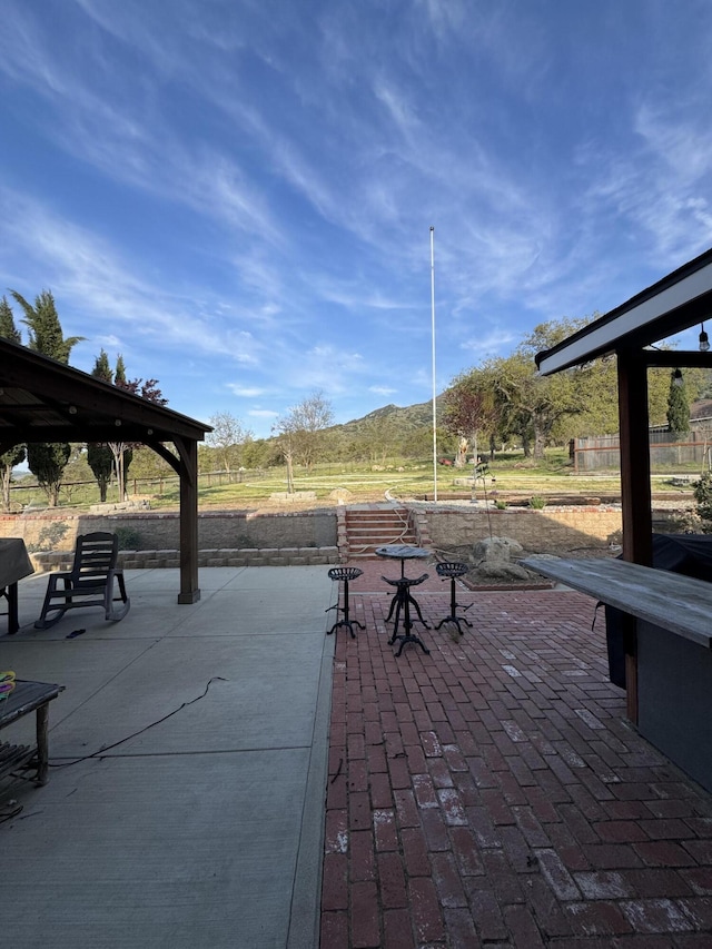 view of patio with a mountain view