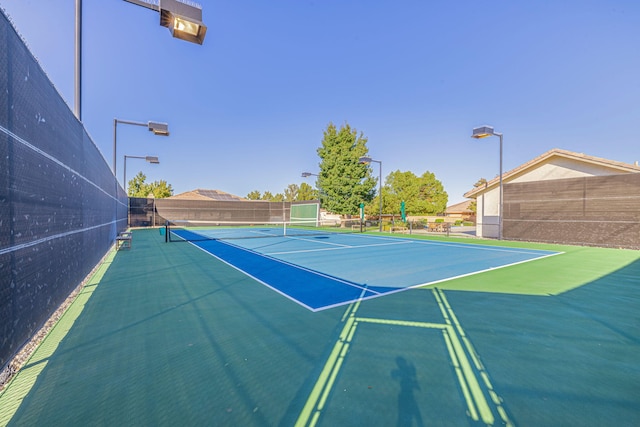 view of tennis court with basketball court