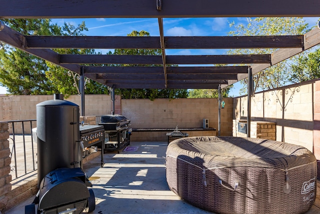 view of patio / terrace featuring a pergola and grilling area