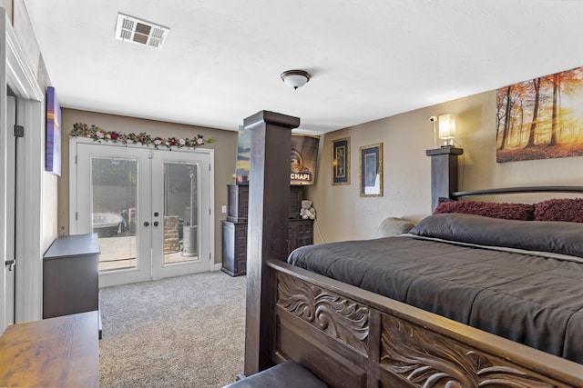 bedroom featuring access to exterior, french doors, and light colored carpet