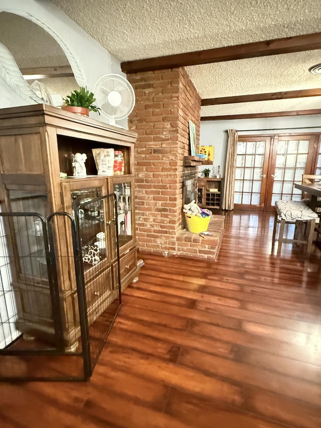 43861 W Elm Ave, Lancaster, CA 93534 - bar area featuring a textured ceiling, wood finished floors, and french doors