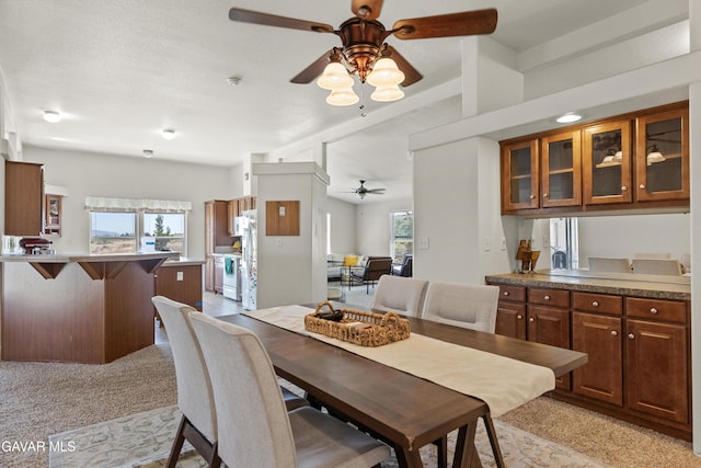 18909 Cheyenne Ave, Tehachapi, CA 93561 - dining space featuring a ceiling fan and light carpet