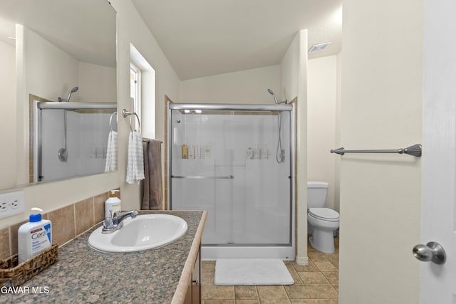 18909 Cheyenne Ave, Tehachapi, CA 93561 - bathroom featuring a shower stall, vanity, tile patterned flooring, and lofted ceiling