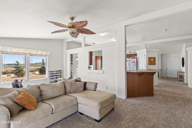 18909 Cheyenne Ave, Tehachapi, CA 93561 - living area featuring lofted ceiling, light carpet, and a ceiling fan
