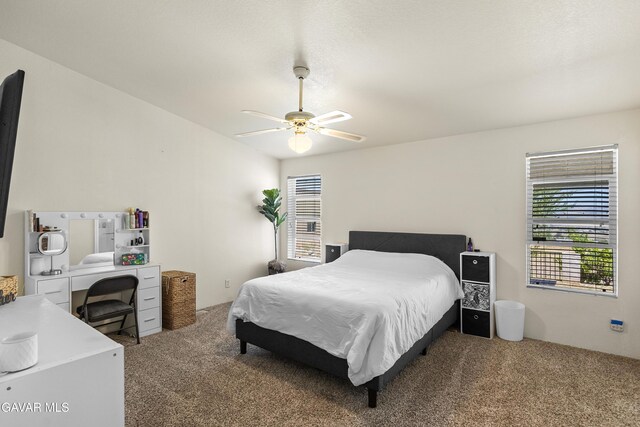 18909 Cheyenne Ave, Tehachapi, CA 93561 - carpeted bedroom featuring a ceiling fan and an office area