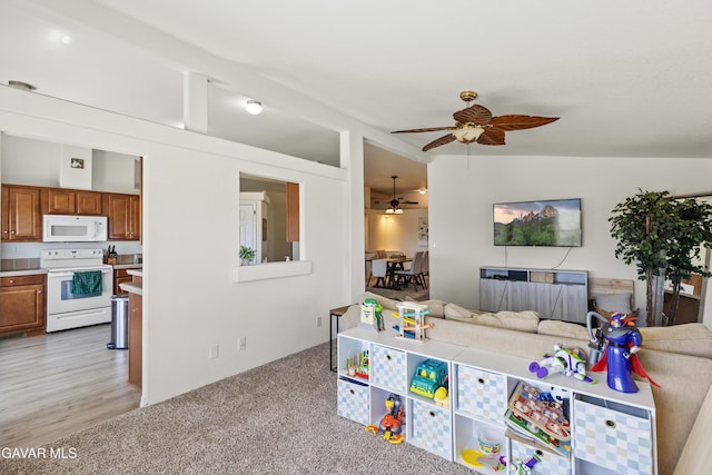 18909 Cheyenne Ave, Tehachapi, CA 93561 - living room featuring ceiling fan and light colored carpet